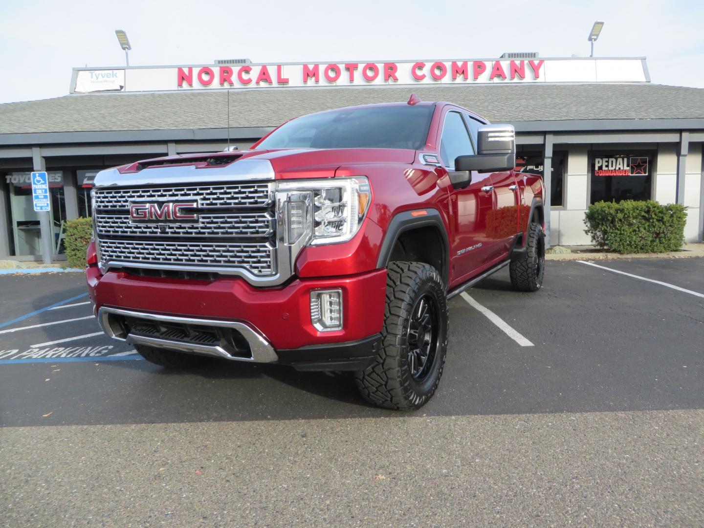 2021 MAROON /BLACK GMC Sierra 3500HD Denali (1GT49WEY1MF) with an Duramax 6.6L Turbo Diesel engine, 10 speed transmission, located at 2630 Grass Valley Highway, Auburn, CA, 95603, (530) 508-5100, 38.937893, -121.095482 - Duramax sitting on a BDS level kit with upper control arms and Fox shocks, 20" XD wheels, and 35" Nitto Ridge Grappler tires. - Photo#0